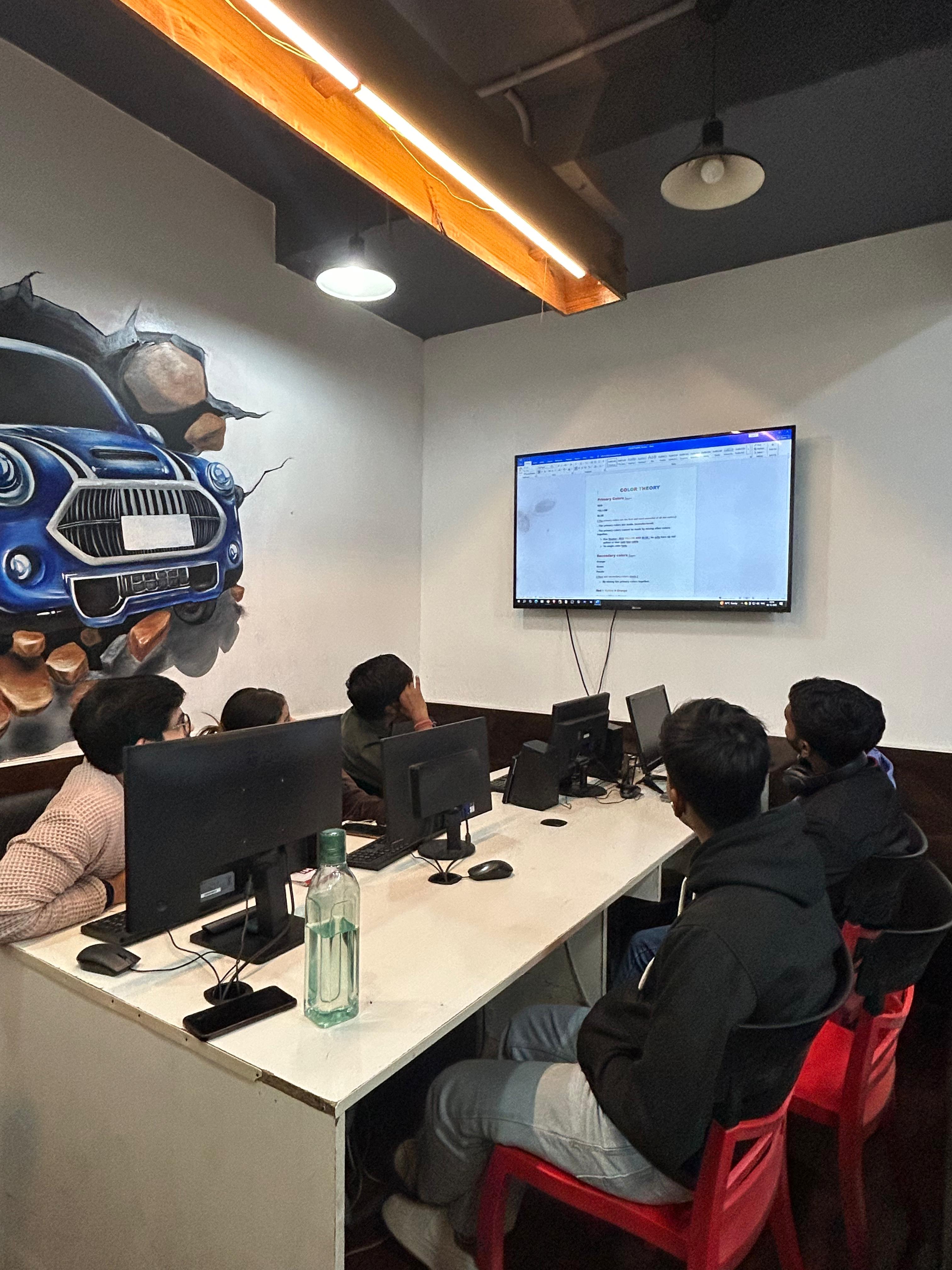 Students with computers and headphones